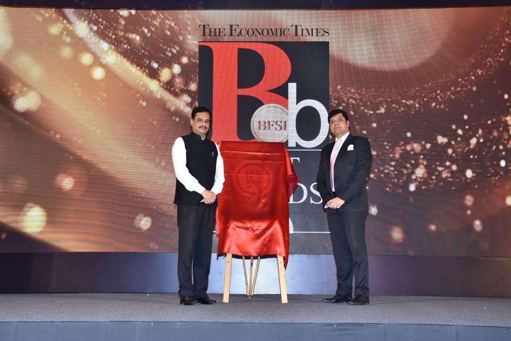 Dr. Ranjit Patil, Minister of State Home unveiling the book the Economic times Best BFSI Coffee Table book