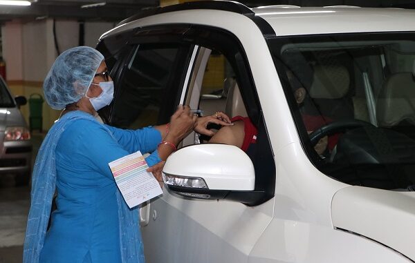 Beneficiary receives 2nd dose of Covishield at free-drive-through vaccination camp organized by M3M Foundation and Health Department, Gurugram at M3M Urbana, Sector 67, Gurugram
