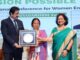 Chief Guest Sandeep Marwah and FIWE President Rajni Aggarwal with an awardee