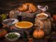 Roasted Thanksgiving Turkey with side dishes and autumn decoration