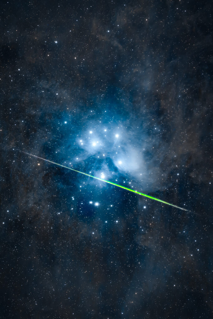 The Meteor and the Star Cluster by photographers Yousif Alqasimi and Essa Al Jasmi 