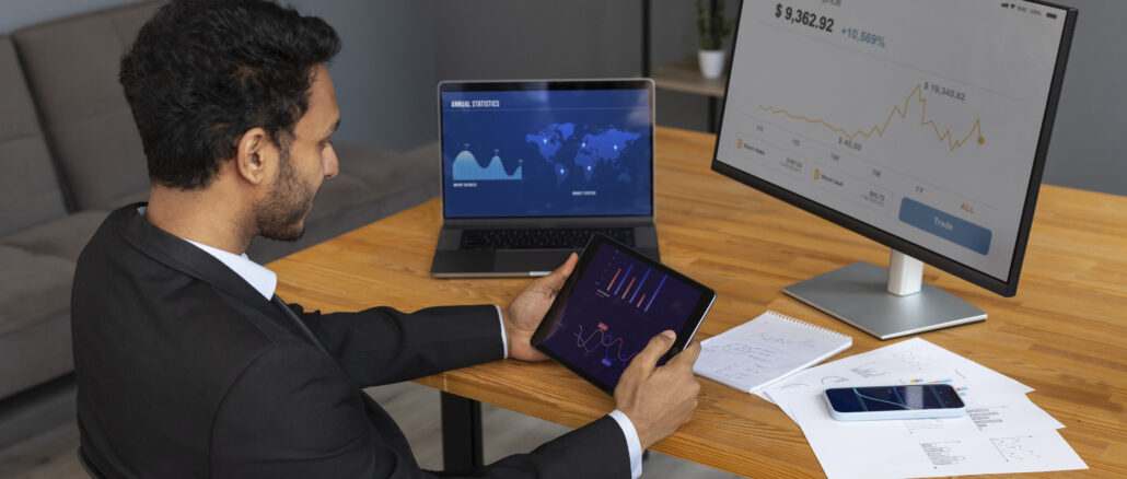business-person-looking-finance-graphs Business Expert, Download MT5, MetaTrader