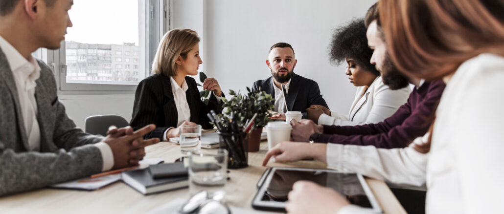 front-view-business-people-talking Decision Making